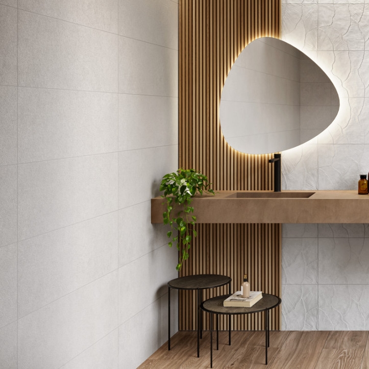 Lavabo avec carrelage blanc et motif